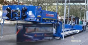 Meusburger — Rimorchio ribassato a 2 assi per il trasporto di mietitrebbie